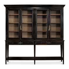 an antique bookcase with glass doors and drawers on one side, in dark wood