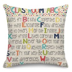 a pillow with the words on it and polka dots in multicolored letters that spell out