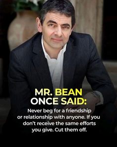 a man in a suit sitting down with his hand on his hip and the words mr bean once said