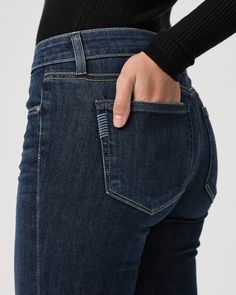 A universally flattering mid-rise style with a fitted silhouette through the hips and thighs, a slim bootcut from the knee down and a slightly shorter 32” inseam. Cut from our TRANSCEND VINTAGE denim in a timeless vintage-inspired dark wash with lived-in details and a raw hem, this pair has the look of authentic vintage denim but is incredibly comfortable with plenty of stretch and recovery. | Manhattan 32 Inch Bootcut Jean - Shipwreck Blue | Size 31 Bootcut Jean, Shipwreck, Fitted Silhouette, Vintage Denim, Straight Jeans, Bootcut Jeans, Ankle Length, Manhattan, Mid Rise