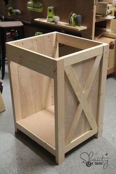 a wooden box sitting on top of a floor