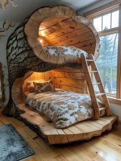 a bed made out of wood with a tree trunk on the bottom and ladder to it