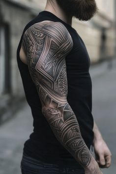 Man with a detailed, geometric sleeve tattoo on his right arm, wearing a sleeveless black shirt. Cover Up Tattoo Ideas For Men, Men’s Tattoos For Arms, Fantasy Full Sleeve Tattoo, Men’s Nordic Sleeve Tattoo, Men’s Geometric Sleeve