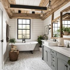 a large bathroom with two sinks and a bathtub