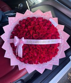 a bouquet of red roses in a pink box with a ribbon that says, yes congratulations me always