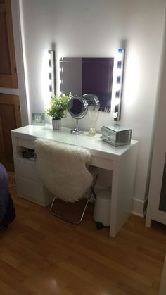 there is a vanity with lights on it