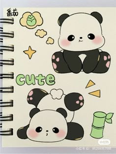 a notebook with panda stickers on it