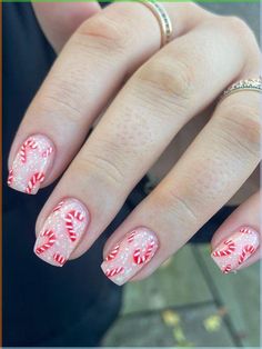 Get into the jingle bell groove with these fun and playful candy cane nails. ‘Tis the season to rock your manicure and spread some Christmas cheer! Candy Cain Nails, Candy Cane Nails Short, Ems Nails, Christmas Nails Candy Cane, Candy Cane Nail Art, Slay Nails, Christmas Gel, Cute Simple Nails