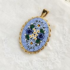 Italian Florentine Micromosaic Jewelry, a brand new product in vintage antique style, made in Italy. Wedding gift.🇮🇹 🩰This is made to order and needs 3-6 weeks to make. It's a brand new product but made in vintage style. CM.2.5x3.5 The price is for one single piece. In stock in Italy.🇮🇹 ⚜️Made in Florence, Italy. 🇮🇹 It's handmade, each of them is different, and it couldn't be 100% as same as the photo. It's a brand new product but made in vintage style. 🩰More items on our website https:/ Micro Mosaic Jewelry, Mosaic Jewelry, Italy Vintage, Antique Wedding, Micro Mosaic, Blue Daisy, Italy Wedding, Florence Italy, Jewelry Pendant