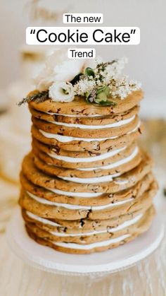 a stack of cookies with flowers on top