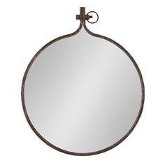 a round mirror with an iron frame and metal accents on the top, against a white background