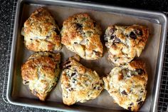 six scones on a baking sheet ready to be baked in the oven or used as an appetizer