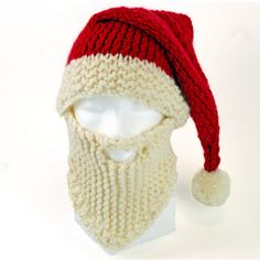 a red and white knitted santa claus hat on a mannequin head