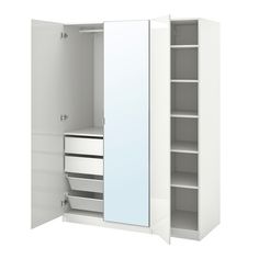 an open white cabinet with drawers and shelves