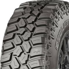 an all terrain tire on a white background