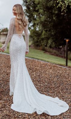 Here is a beautiful sequin and crystal beaded long sleeve backless wedding gown with open bust line that is available as shown or with any changes. #Brides can also email us their dream #weddingdress #photos and we can easily recreate that #design as well. For more info on #custom #weddingdresses please contact us directly. Backless Wedding Gown, Wedding Gown Backless, Open Bust, Backless Wedding, Wedding Gown, Crystal Beads, Wedding Gowns, Sequin, Wedding Dresses