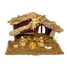 a nativity scene with figurines in the manger