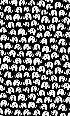 an elephant pattern is shown in white on black background, it's all over the place