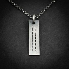 Sterling silver personalized engraved Morse code necklace. The beauty of a Morse code necklace lies in its ability to convey a hidden and personal message. The message can be anything you desire, from a loved one's name, a meaningful date, a motivational phrase, or a secret message that only you and a select few know how to decode. Furthermore, if you have a specific design in mind or would like a different font for the engraving, please don't hesitate to reach out to me. I'm here to assist you Code Morse, Morse Code Necklace, Jewelry Mens, Minimalist Gifts, Morse Code, Custom Pendants, Secret Messages, Engraved Necklace, Gifts For Boys