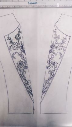 two pieces of sewing fabric with flowers on the front and back, side by side