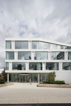 a large white building with lots of windows