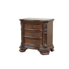 an ornate wooden nightstand with three drawers