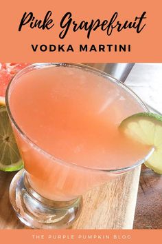 the pink grapefruit vodka martini is garnished with lime