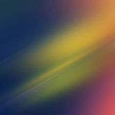 a blurry image of an orange, yellow and blue background with some lines on it