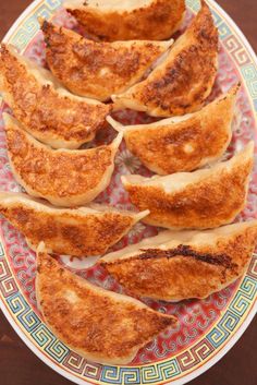 several pieces of bread on a colorful plate