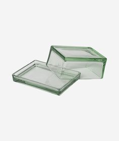 two glass dishes sitting on top of each other