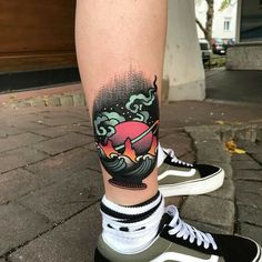 a person with a tattoo on their leg