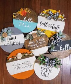 six painted wooden signs with the words hello fall, happy fall, and you're here