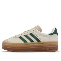 The adidas Gazelle Bold 'Cream Collegiate Green', seamlessly blends neutral tones with the timeless Gazelle style. Crafted with a suede upper, this shoe exudes understated elegance. The mudguard, also in suede, features a slightly deeper shade, adding depth to the design. Dark green leather 3-Stripes adorn the sides, while the classic gum sole in a neutral tan hue ensures comfort and durability. Adidas Gazelle Bold, Gazelle Bold, Adidas Originals Gazelle, Fur Heels, Low Air Jordan 1, Adidas Campus, Air Jordan 1 High, Air Jordan 1 Low, Jordan 1 High