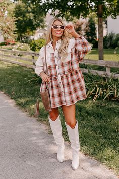 - Pumpkin spice vibes are in the air with this adorable mini dress! With its adorable babydoll cut and fall hued plaid print, it is perfect for the transition into breezy days. - Unlined material with a sky blue, black, cream, oatmeal, and rust colored plaid print as well as cream colored corduroy accents material - A collared neckline - A buttoned front - Functional chest pockets - Long sleeve with drop shoulders and elastic cuffs - Hidden side pockets - A relaxed silhouette that ends in a mini Plaid Mini Dress, Concert Fashion, Essential Dress, A Sky, Knee High Leather Boots, Distressed Shorts, Curve Dresses, Rust Color, Tunic Blouse