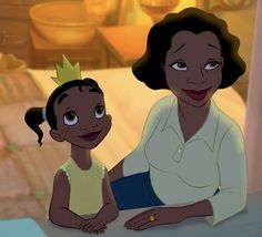 the princess and the frog is sitting next to each other in front of a bed