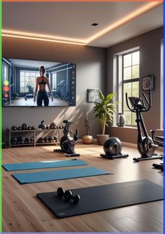 a gym with exercise equipment and yoga mats in front of a flat screen tv on the wall