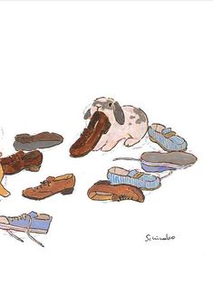 a drawing of some shoes and a cat laying on the ground next to one another