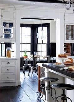 the kitchen is clean and ready to be used for cooking or baking, as well as other things in the dining room