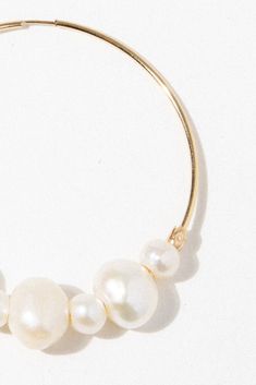 Pearl hoop earrings inspired by ancient Egyptian Lion Goddess, Tefnut, the goddess of water and fertility. She was strongly associated with the moon and the sun. Her name means, “she of moisture...” The accessory of your oceanic dreams. ✦ Measure 2 inches tall / 14K GF hoops ✦ Adorned with real freshwater pearls * Size and shape of pearls slightly vary by nature Egyptian Lion, Lion Goddess, Goddess Of Water, The Moon And The Sun, Moon And The Sun, Peace Necklace, Unique Symbols, Gold Filled Hoops, Gold Pearl Earrings