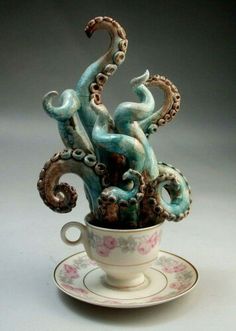 an octopus in a teacup with saucer