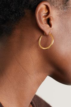 From the 'Magnetic' collection, Viltier's 'Rayon Disco' hoops are handcrafted in Paris from 18-karat gold and intricately carved with dainty lines to give them a light-catching finish. Make them your every day signature. Modern Hammered Hoop Earrings For Formal Occasions, Modern Hammered Hoop Earrings For Formal Events, Luxury Brass Hoop Earrings As Gift, Polished Hoop Earrings In Recycled Gold, Recycled Gold Hoop Earrings With Polished Finish, Recycled Gold Hoop Jewelry With Polished Finish, Formal Small Hoop Hammered Earrings, Formal Small Hoop Earrings With Hammered Detail, Formal Small Hoop Brass Jewelry