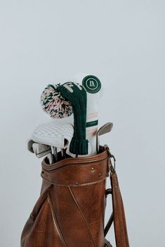 a brown leather purse filled with personal items