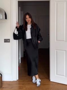 Chill But Classy Outfits, Black Silk Slip Skirt Outfit, Silk Midi Skirt Outfit Fall, How To Style Black Midi Skirt, Long Black Skirt Outfits For Winter, Black Silk Skirt Outfit Fall, Sambas Adidas Women Outfit Skirt, Black Long Skirt Outfit Ideas, Long Black Skirt Fall Outfit