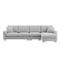 a gray couch with pillows on it