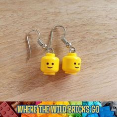 there is a pair of lego earrings on the table