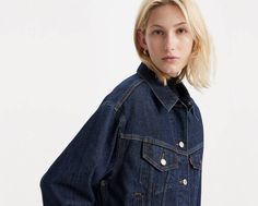 Our iconic '90s Trucker Jacket gets a cropped update. You'd be hard-pressed to find a jacket with an easier shape, more versatile weight or inherent sense of cool. Bonus: This throwback cut features a pitched silhouette for a distinctly ‘90s feel. An homage to our iconic Levi’s® Trucker Jacket Constructed with a unique pitched '90s profile and two-flap pocket design Cut with a cropped, relaxed fit A blank canvas for self-expression that can be passed down for generations Gets better over time with natural wear Easy Shape, Karen Walker, Trucker Jacket, Pocket Design, Recycled Cotton, Jean Jacket, Farmer, Blue Denim, Denim Jacket