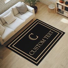 a living room area rug with the words custom text on it and a couch next to it