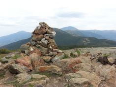 a pile of rocks sitting on top of a mountain