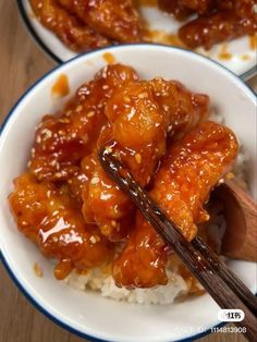 two white bowls filled with food and chopsticks