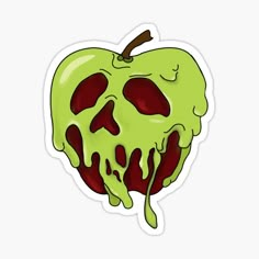 an apple covered in green liquid with a spooky skull on it's side